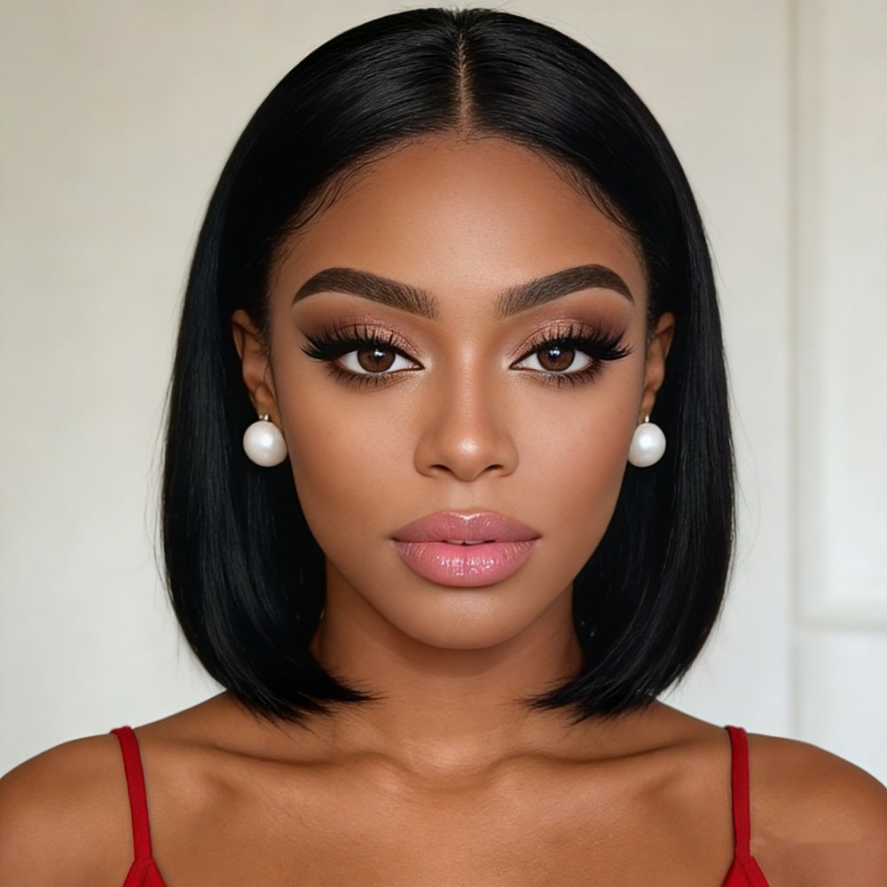 Black center-part bob wig shown from the front on a model